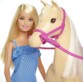 Barbie in Reitkleidung mit ihrem Pferd